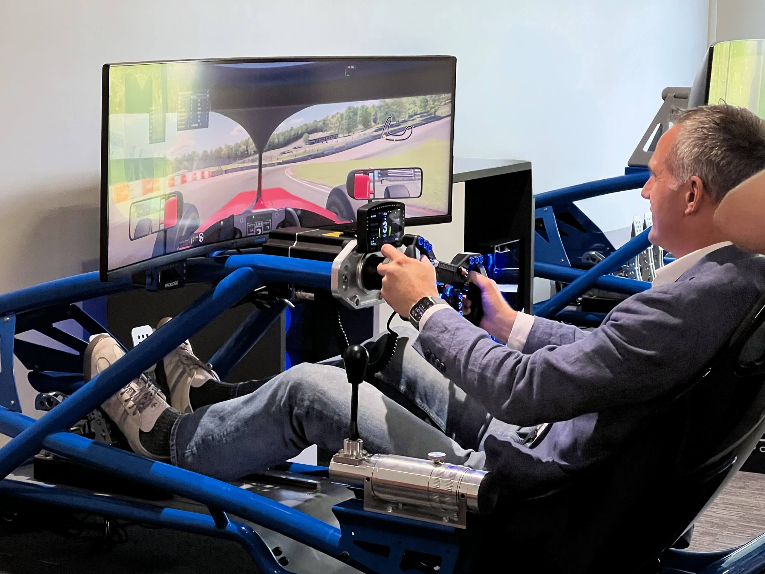 Business Secretary Peter Kyle tries out the Motorsport UK simulator
