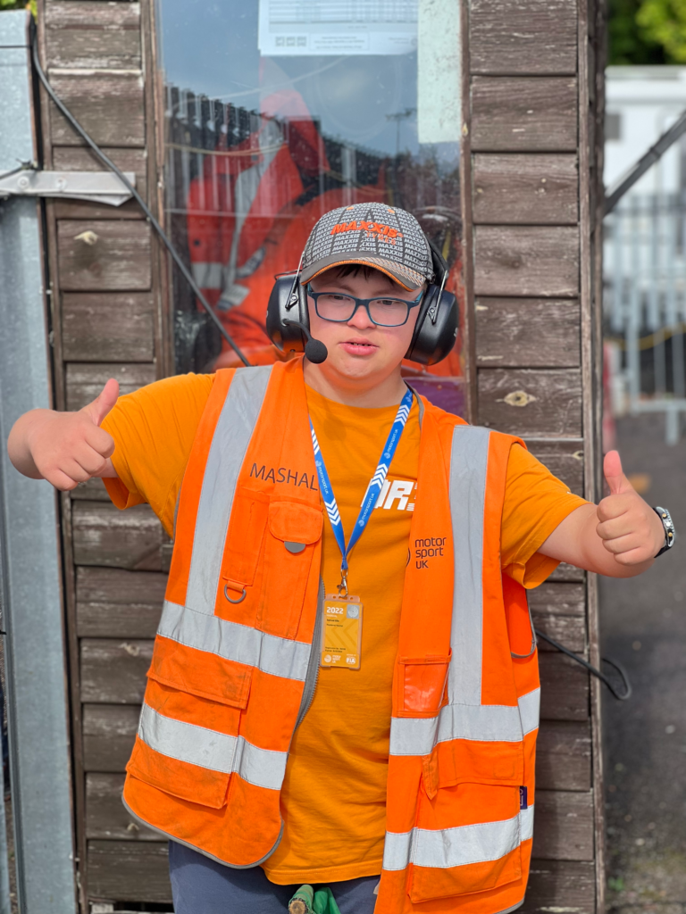 Giving the dummy grid his thumbs-up of approval
